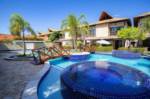 Poco Casa | Villas de Fiji: Bangalô em Condomínio com Piscinas e Praia a Poucos Passos