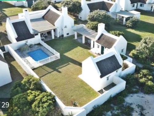 Struisbaai Casa | Voete ini Sand Langezandt Cottage