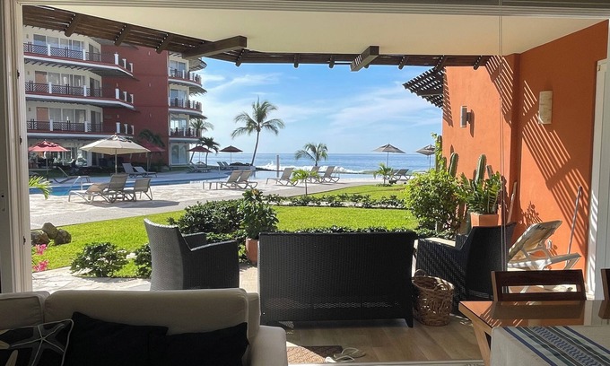 Bajos de Chila Condominio | Walk out to pool and ocean steps away.