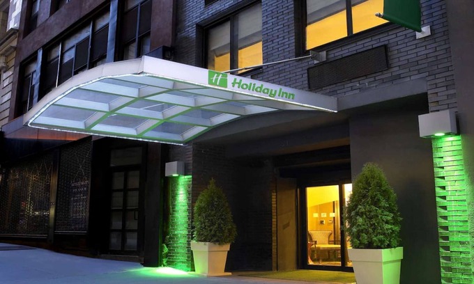 Financial District Hotel | Walk to One World Trade + Fitness Room & Wi-Fi