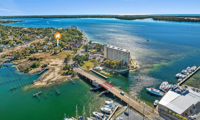 Panama City Casa | Watch the boats passing through Massalina Bayou from the front porch.