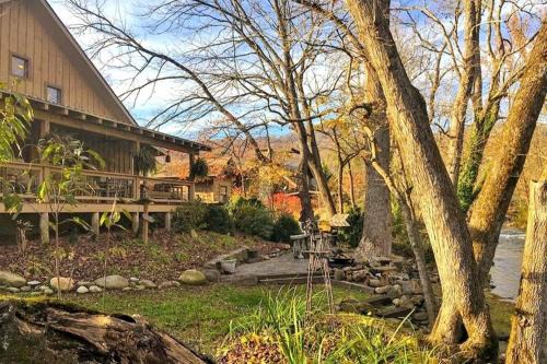 Bryson City Casa | Water's Edge ~ Covered Porch w/Deep Creek as your Backyard Haven
