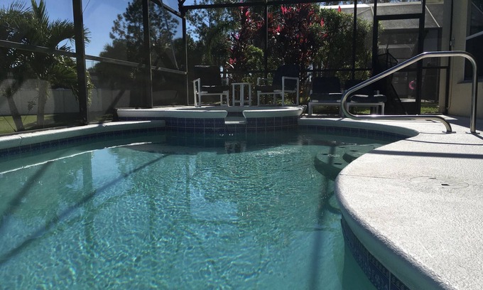Windsor Palms Casa | Vista del agua - Piscina y spa - 3. 5 millas de Disney - WiFi - TV / Netflix - Wii - Barbacoa