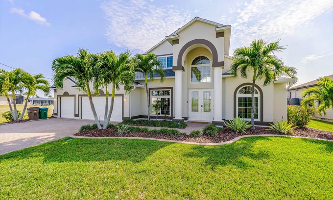 Burnt Store Casa | Waterfront dog-friendly house with pool, dock, pool spa, patio & sunrise views