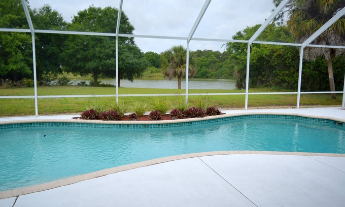 Broadmoor Casa | FRENTE AL AGUA, PISCINA CLIMATIZADA, 3/2/2 unifamiliar Rotonda West Home