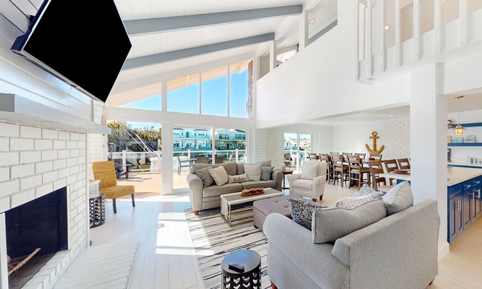 Channel Islands Casa | Waterfront home with kayaks, grill, Pac-Man, AC, balconies, & smart TVs