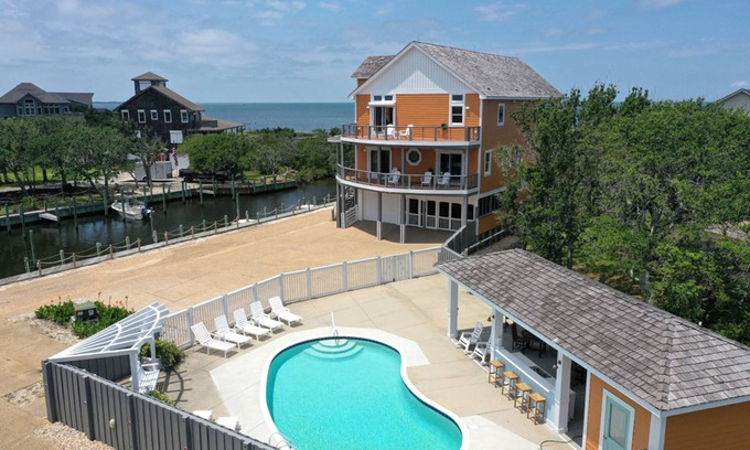 Sunset Village Casa | Waterfront home with ocean views, private pool, hot tub, & Tesla/EV charger