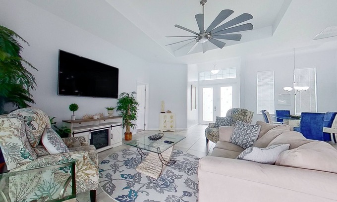 Trafalgar Casa | Waterfront home with private pool, dock, WiFi, central AC, and desk workspaces