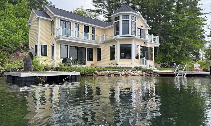 Alton Bay Casa | Waterfront New Construction 4 bedroom home w private U shaped dock Private beach