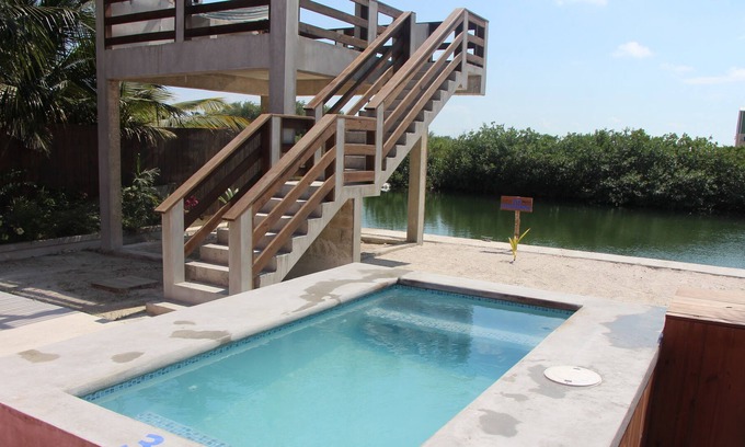 San Pedro Casa | Waterfront Oasis w/ Pool & 20ft Raised Deck, WiFi, A/C All Rooms - No Clean Fee