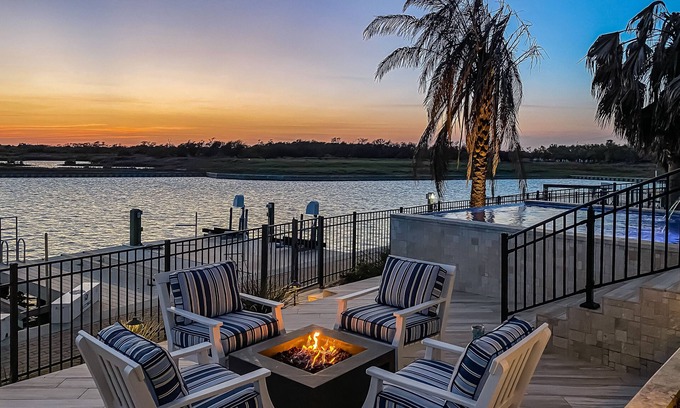 Rockport Casa | Waterfront paradise with private pool, dock, poolside TV & multi-TV game room