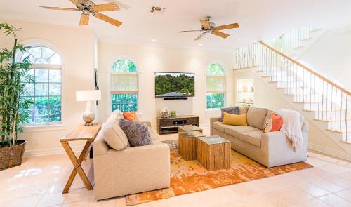Captiva Casa | Waterfront Pink House with Private Dock & Pool