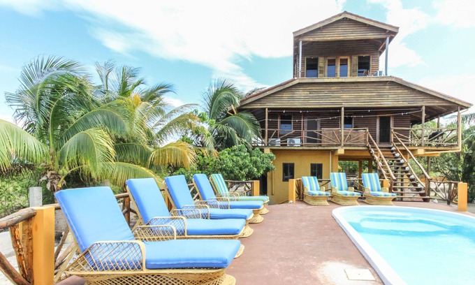 Boca Ciega Casa | Villa frente al mar única con balcón privado y terraza de la piscina: ¡a pie de la playa!