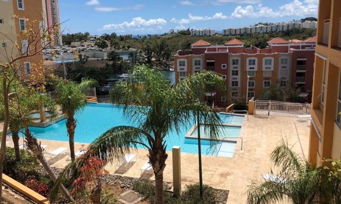 Fajardo Condominio | Plush Caribbean Condo- Marina, piscina y vista al mar! ¡TOTALMENTE REFORMADO, A ESTRENAR!