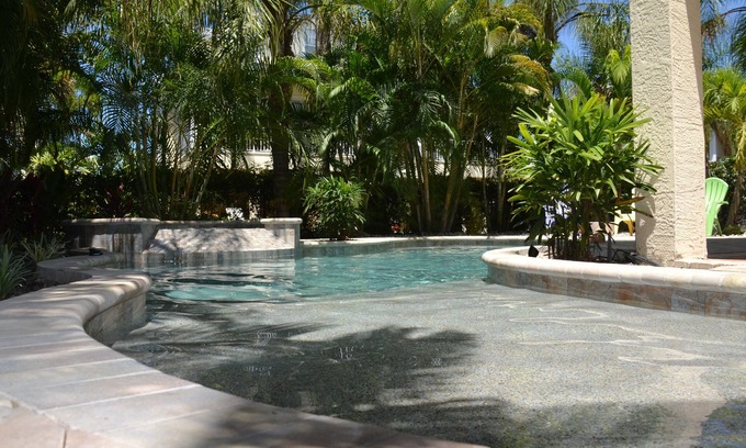 Holmes Beach Casa | A Pearl of A Beach Home - lujosa piscina privada climatizada y spa - para familias