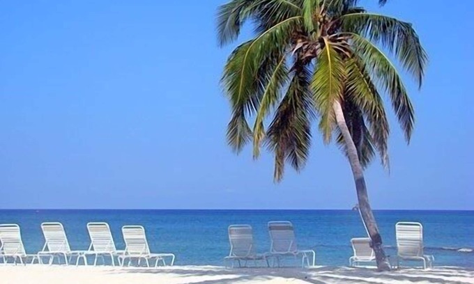 Seven Mile Beach Condominio | Tu casa de vacaciones en la playa te espera! Echa un vistazo a nuestras tarifas de septiembre / octubre de 2019!