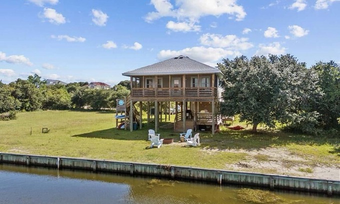 Carova Beach Cabaña | Welcome to the Cool Change Beach Cottage, Canal front 4x4 area of Carova Beach.