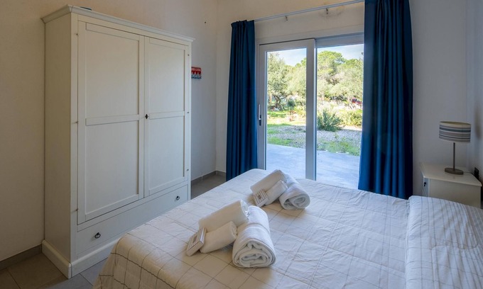 Cala Liberotto Apartamento | Welcomely - Porto Corallo Seafront