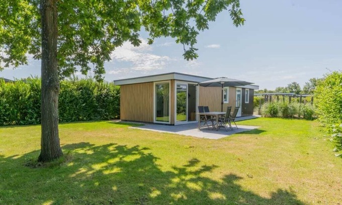 Burgh-Haamstede Casa | What immediately catches your eye upon entering is the garden-oriented living room with open kitchen