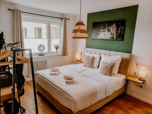 Wolfsburg Apartamento | Wohlfühlapartment, Parkplatz, Boxspringbetten, Massagesessel, Nespresso, 1Gbit LAN & WIFI, Innenstadt