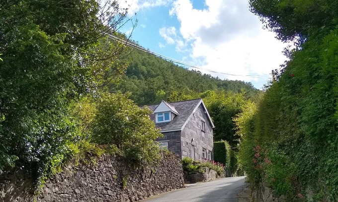 Trefriw Cabaña | Old Rectory Cottage, cerca de Betws y Coed en el Parque Nacional Snowdonia. Perro amigable
