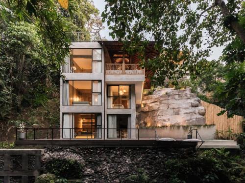 Petulu Villa | Your Exclusive Escape into Nature with Stunning Art Luxury and Riverfront Views