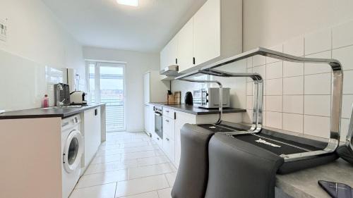 Neumuenster Apartamento | Zentrale Apartments in Neumünster direkt an der Stadthalle mit Küche & WLAN