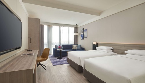 Habitación, varias camas, vistas al jardín