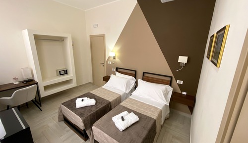 Habitación Confort con 1 cama doble o 2 individuales