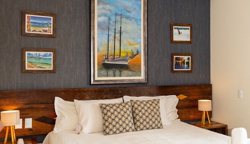 Suite Deluxe, 1 cama de matrimonio grande, Aire acondicionado, vistas parciales al mar