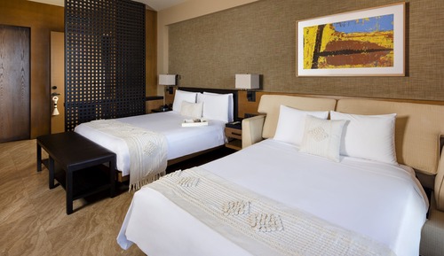 Habitación Deluxe, 1 cama de matrimonio grande con sofá cama, vistas al complejo turístico