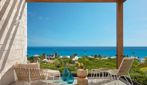Habitación junior, 2 camas dobles, vistas parciales al mar