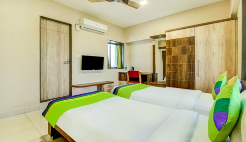 Habitación triple familiar, varias camas, en la zona del jardín