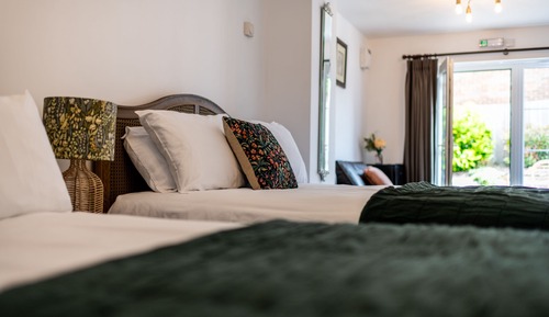 Suite superior, baño privado, vistas al patio