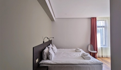 Habitación estándar con 1 cama doble o 2 individuales