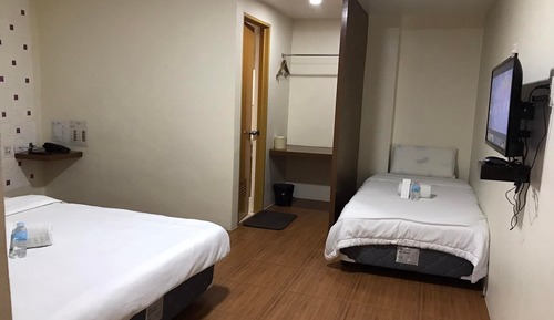 Habitación triple Deluxe