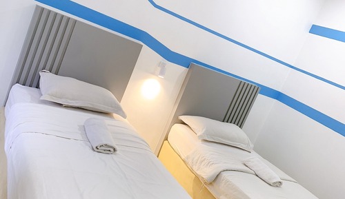 Habitación panorámica con 2 camas individuales, varias habitaciones, no fumadores