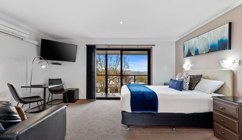 Suite estudio estándar, 1 cama de matrimonio, balcón, vistas al jardín