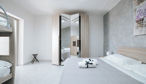 Habitación cuádruple Deluxe