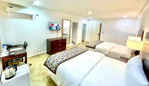 Habitación Deluxe con 1 cama doble o 2 individuales, 2 camas dobles, vistas al patio