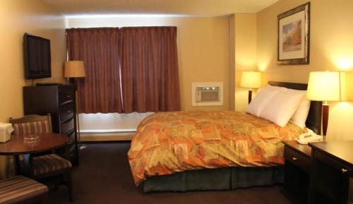 Suite, 2 camas de matrimonio, cocina básica