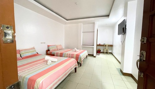 Habitación cuádruple Deluxe