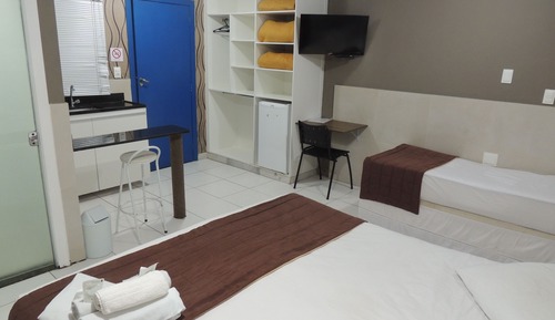 Habitación triple, varias camas