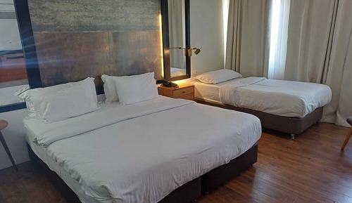 Habitación triple Deluxe