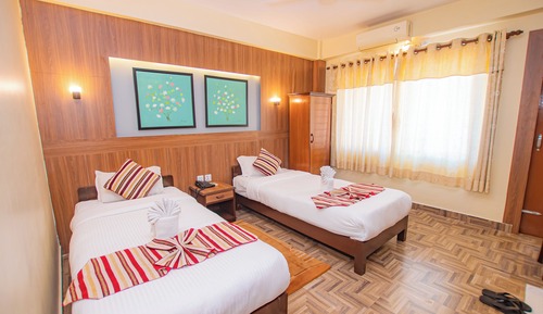 Habitación triple Deluxe