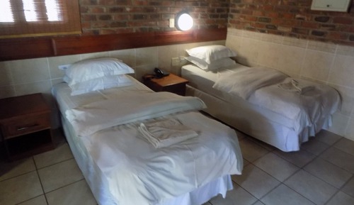 Habitación estándar con 1 cama doble o 2 individuales