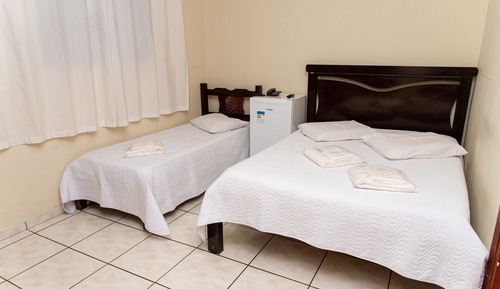 Habitación triple Deluxe, varias camas