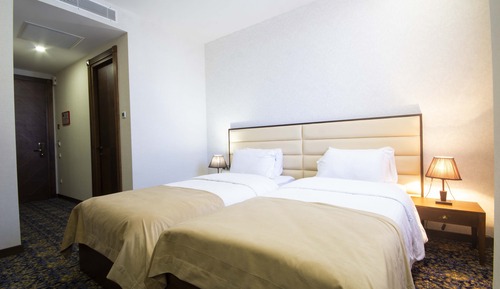 Habitación estándar con 1 cama doble o 2 individuales