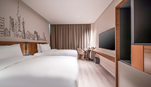 Habitación básica con 2 camas individuales