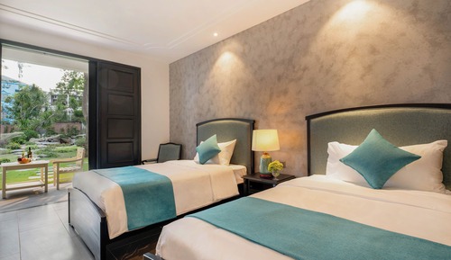 Habitación Deluxe, varias camas, vistas al jardín